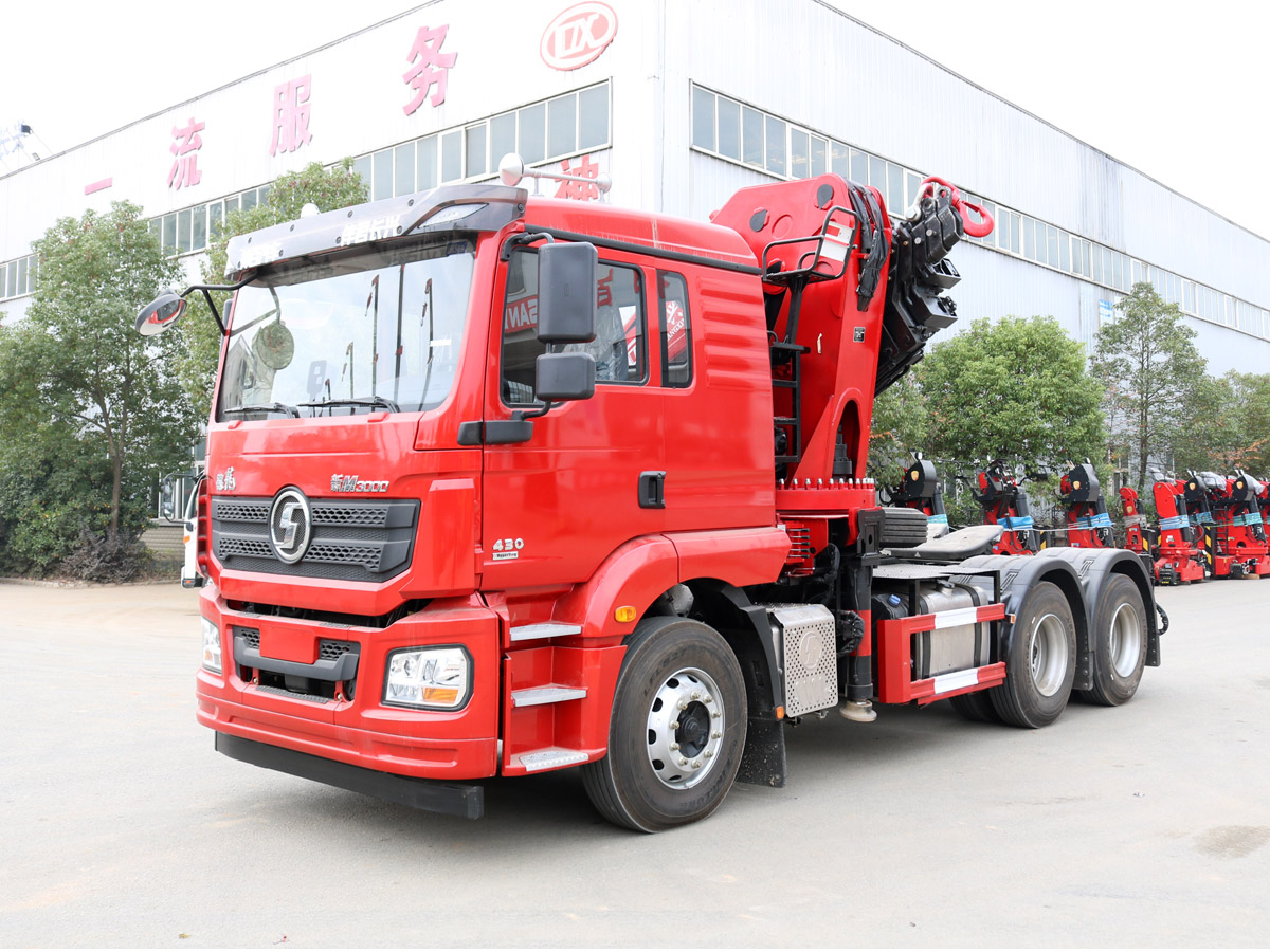 陜汽德龍新M3000牽引頭上裝長興40噸折臂式吊機